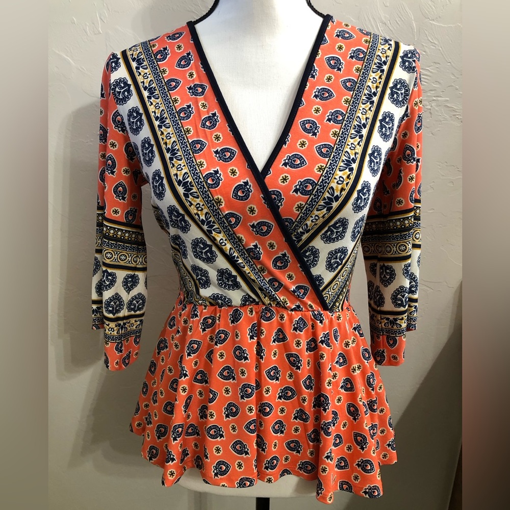Top with half sleeves. Has been worn once.